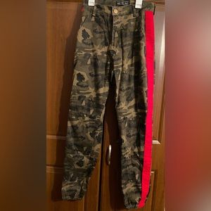 Camo Pants w red stripe on each sides. elastic at ankles to make more fitted.